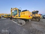 Used Excavator in yard,Back of used Excavator,Side of used Excavator under setting sky,Front of used Excavator